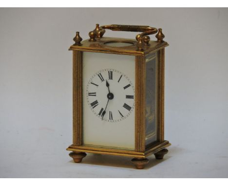 A miniature brass carriage clock, c1900, with enamel dial and eight day movement