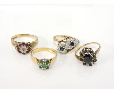 A 9ct gold illusion set diamond and ruby cluster ring, a 9ct gold oval sapphire cluster ring, a 9ct gold sapphire and diamond