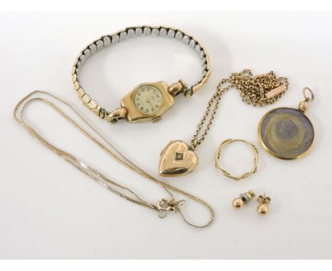 A 9ct gold ladies Trebox mechanical watch head, on a later rolled gold bracelet, a 9ct gold heart shaped locket set with sing