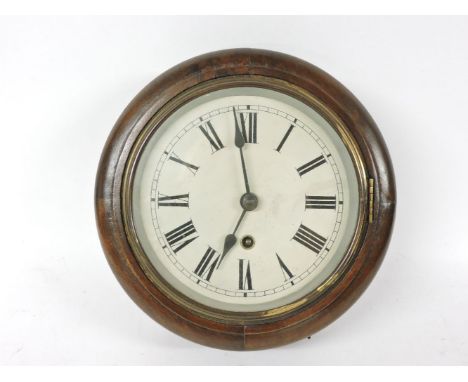 A 20th century mahogany cased clock with enamel face, pendulum and key