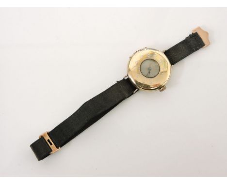 A Continental 9ct gold ladies half hunter style strap watch, white enamel Arabic numerals to case, 15.0g