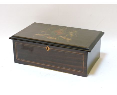 A late 19th century Swiss musical box, playing twelve airs and striking on four bells, with butterfly strikers, the lid with 