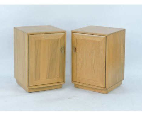 A pair of modern Ercol light elm bedside cabinets, each 46cm wide