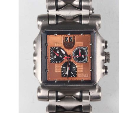 An Oakley Minute Machine Titanium gentleman's chronograph bracelet wristwatch with quartz movement, the signed copper dial wi