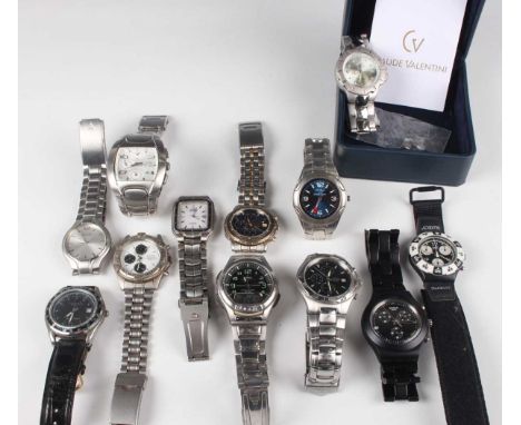 A collection of twenty gentlemen's wristwatches, including Casio, Citizen, Accurist, Sekonda and two Swatch watches.