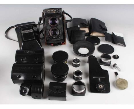 A Yashica Mat-124 G twin-lens Reflex camera, Serial No. 6074238, with Yashinon 1:2.8 f=80mm and 1:3.5 f=80mm lenses, with bla