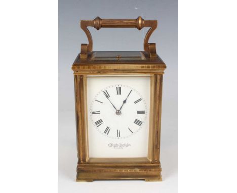A late 19th century French brass cased carriage clock by Drocourt with eight day movement striking and repeating on a gong, t