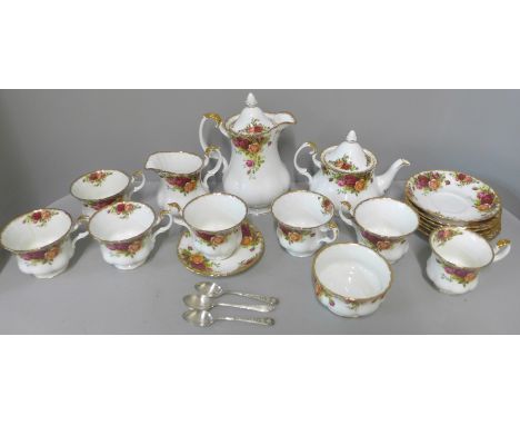 A Royal Albert Old Country Roses six setting tea service and a coffee pot 