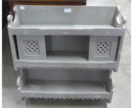 A Polish painted pine spice rack 