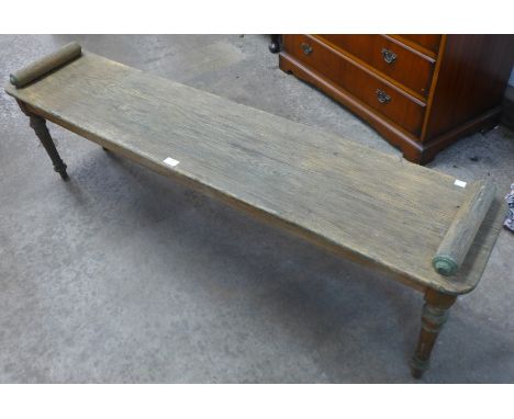 A Victorian oak bench 