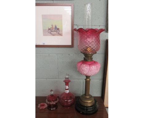 Collection of cranberry glass together with an oil lamp - shade A/F 