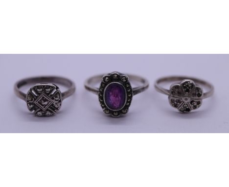 Silver and amethyst ring with 2 other silver marcasite rings 