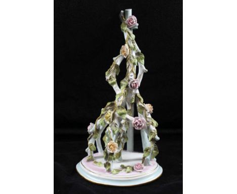 A GERMAN PORCELAIN HANGING WALL SHELF, floral encrusted, 31cm 