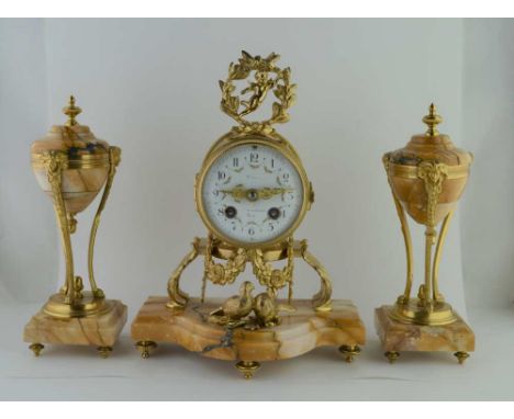 A LATE 19TH CENTURY FRENCH GARNITURE CLOCK SET, veined marble and gilt metal, the mantel clock with swags, love birds and put