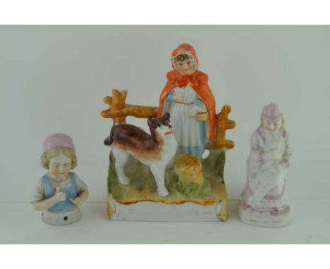 A LATE 19TH CENTURY CONTINENTAL CERAMIC FIGURE GROUP, Little Red Riding Hood with the Wolf, 12cm high, together with a figura