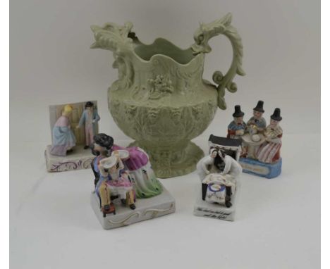 FOUR LATE VICTORIAN POTTERY FAIRINGS, to include; "The Last into bed to put out the Light", 8cm high, and a late Victorian mo