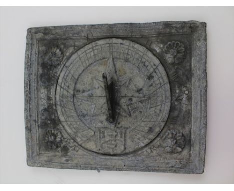 A LEAD SUNDIAL PANEL OF 18TH CENTURY DESIGN, rectangular with scallop devices to the corners, gnomon set upon a star design w