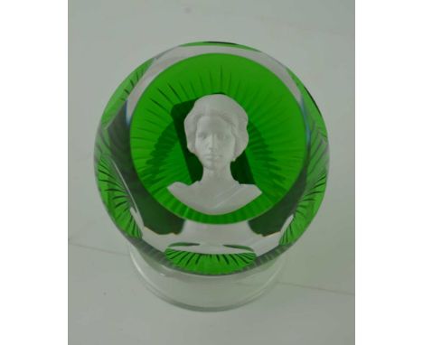 A BACCARAT FACET GLASS PAPERWEIGHT, green base inset sulphide portrait of HRH Princess Anne, base 7.5cm in diameter 
