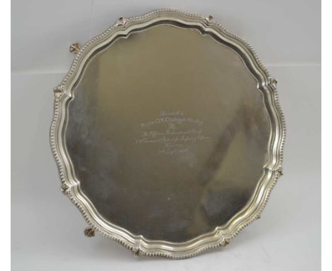 WILSON & SHARP A GEORGIAN DESIGN SILVER SALVER, beaded piecrust rim, raised on four ball and claw feet, presentation engraved