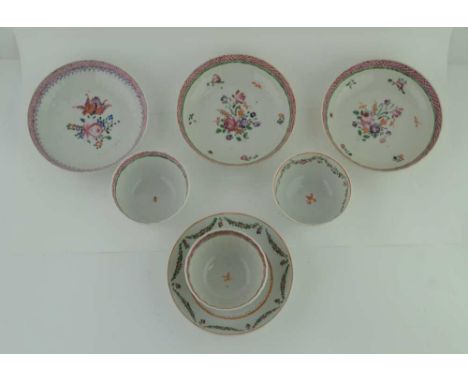 A PAIR OF LATE 18TH CENTURY PORCELAIN TEA BOWLS &amp; SAUCERS, hand painted floral decoration together with a floral swag pai