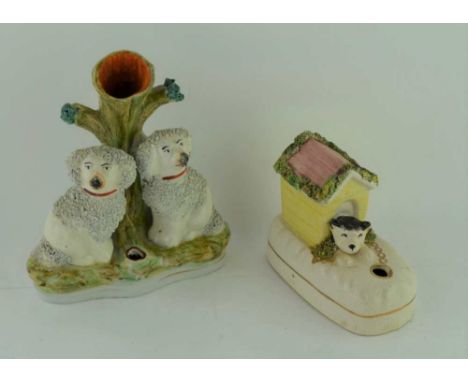 A 19TH CENTURY STAFFORDSHIRE POTTERY INKWELL, moulded in the form of a dog in it's kennel, 8cm high, together with A COMBINED