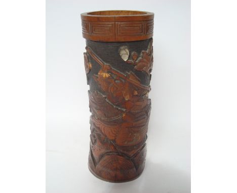 A large Japanese bamboo vase carved with a mounted samurai, losses to bone and mother of pearl decoration.
49cm high. 