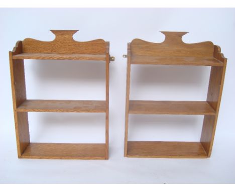 A pair of Arts and Crafts light oak open hanging shelves, each 42.5 x 14 x 58.5cm high. 