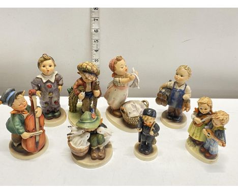 A selection of assorted Goebel figurines, shipping unavailable