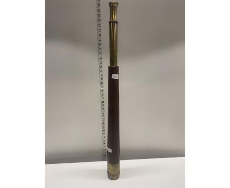 A antique single drawer Officer of the Watch nautical telescope made by H Hughes and Son Ltd London, with broad arrow mark to