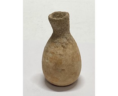 A Greco-Roman Unguentarium antique ceramic vessel.