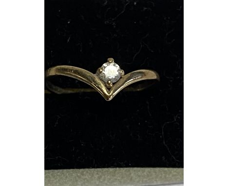 A 9ct gold and white stone ring 0.68g size L