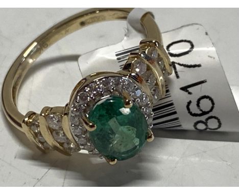 A 9ct gold and premium Emerald moissonite ring 2.70g size M