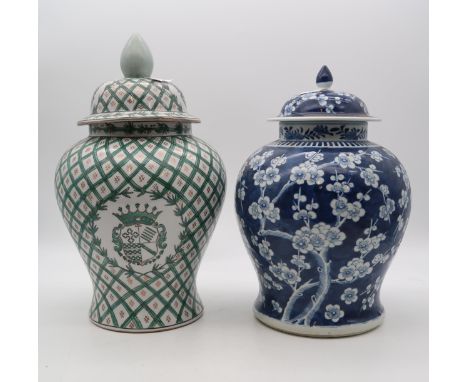 A large Chinese blue and white prunus cracked ice pattern lidded ginger jar (broken to rim &amp; chipped to lid), 19th centur