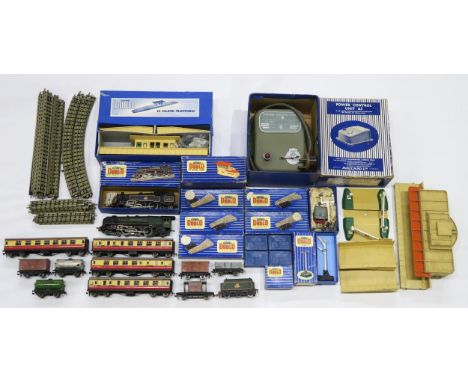 A quantity of Hornby Dublo 00-gauge model railway locomotives, stock, track, structures and accessories, largely being boxed 
