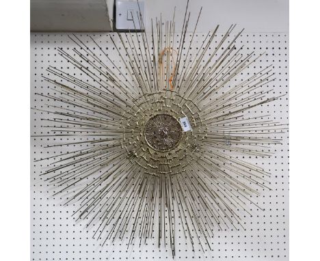 A sunburst wall art piece in the style of&nbsp;Curtis Jere Condition Report:No condition report available.