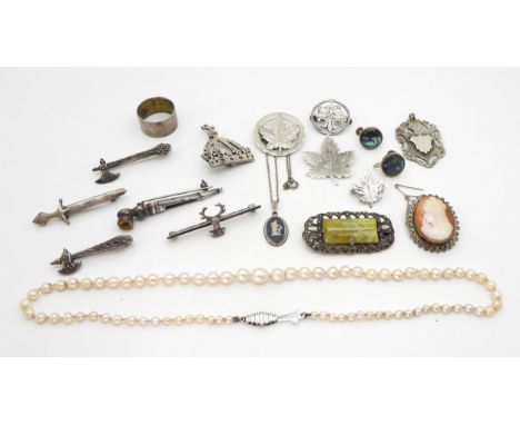 A silver Robert Allison brooch in the shape of an axe with Glasgow hallmarks for 1954 and other Scottish makers, a Connemara 