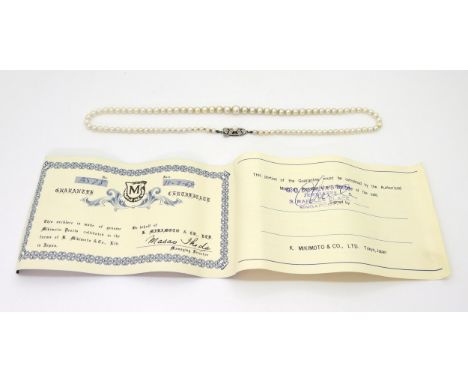 A string of Mikimoto pearls, length 45cm, with a silver pearl set Mikimoto branded clasp, largest pearl approx 6.9mm, smalles