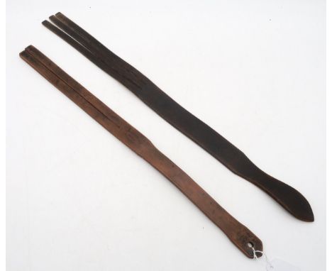 A John J. Dick of Lochgelly school tawse, of heavyweight leather, stamped "H" at end of grip, together with a lighter-weight 