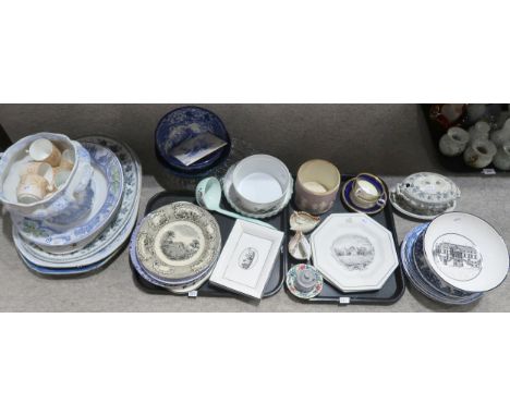 A collection of tablewares including blue and white transfer printed items and black and white printed items mainly with an a
