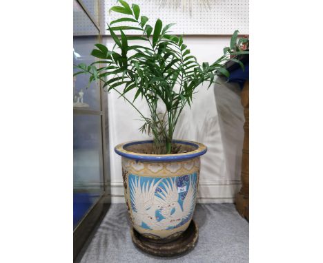 A large planter and stand with house plant Condition Report:No condition report available.