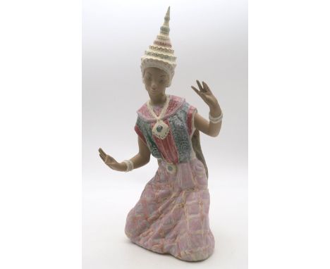 Lladro figure of a Thai Dancer kneeling, sculpted by Vincente Martinez Condition Report:good condition, Needs a wash