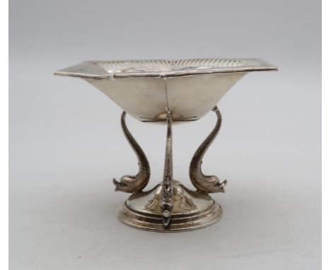 A silver footed dish, by R F Mosley &amp; Co, Sheffield 1909, of hexagonal form, on three dolphin feet and a circular base, 1