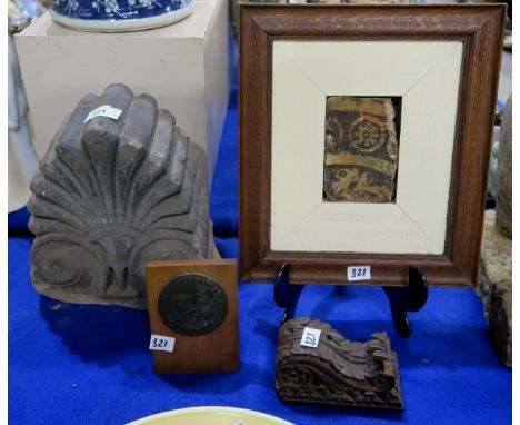 A sandstone fan and scroll architectural ornament, a framed tile piece, purportedly from the Bapistry at Canterbury Cathedral