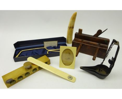18th/ 19th century wrought iron Betty lamp, 19th century Walrus tusk, 19th century smoothing plane, Kynoch ivorine advertisin
