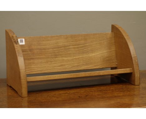 'Mouseman' carved oak book trough, by Robert Thompson of Kilburn, W45cm