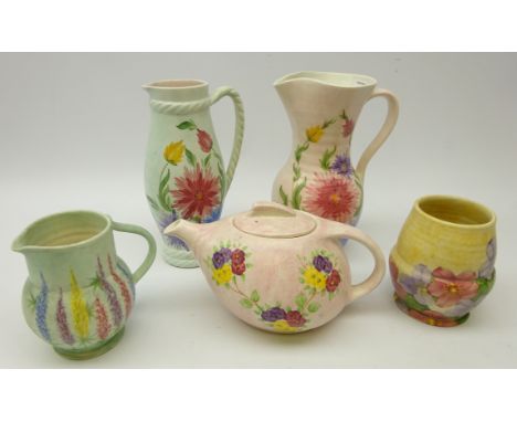 Five pieces of Radford pottery comprising teapot, two jugs, H24cm, vase and smaller jug, each with floral decoration