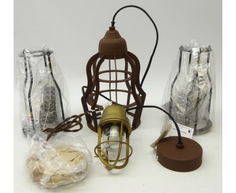Industrial style heavy brass single light fitting with guard and three other similar single light fittings, all as new, some 