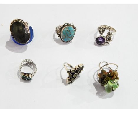 Silver-coloured metal and labradorite ring, another set with turquoise, another set with peridot, another set with small emer