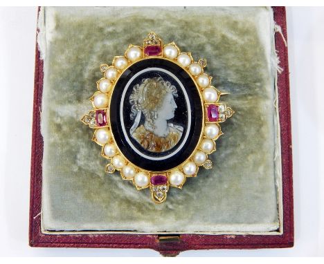 Victorian gold carved onyx cameo, diamond, ruby and pearl pendant brooch, the central oval onyx cameo carved with head and sh