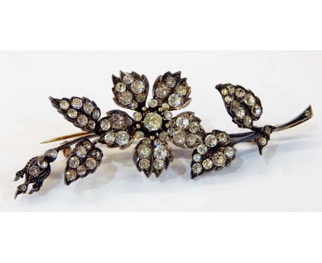 Victorian paste floral spray brooch set white and yellow metal with old cut shaped stones, 10cm long and 19th century paste s
